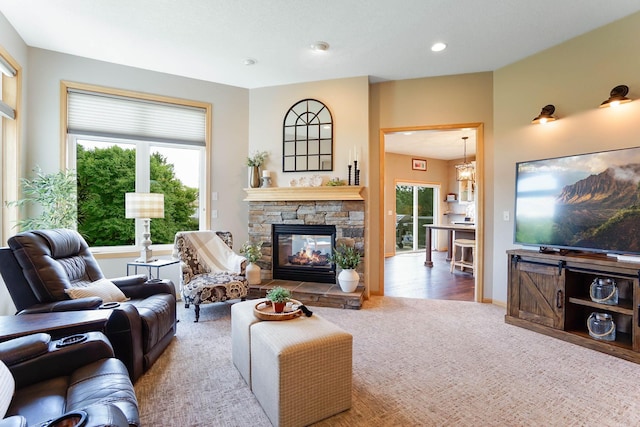2064 141st Ln NE, Ham Lake, MN 55304 - carpeted living room featuring a stone fireplace and recessed lighting