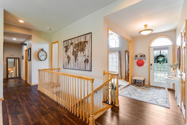 2064 141st Ln NE, Ham Lake, MN 55304 - foyer featuring wood finished floors, healthy amount of natural light, recessed lighting, and a textured ceiling