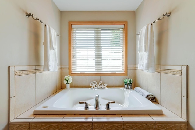2064 141st Ln NE, Ham Lake, MN 55304 - bathroom with plenty of natural light and a bath