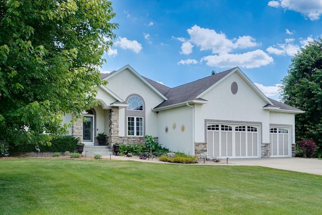 2064 141st Ln NE, Ham Lake, MN 55304 - view of front of home with stone siding, stucco siding, an attached garage, and a front yard