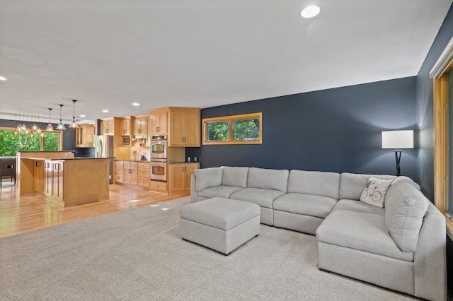 9610 28th Ave N, Plymouth, MN 55441 - living area featuring recessed lighting, light carpet, and a chandelier