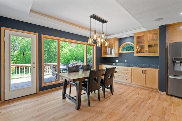 9610 28th Ave N, Plymouth, MN 55441 - dining room featuring a tray ceiling, healthy amount of natural light, light wood-style flooring, recessed lighting, and a chandelier