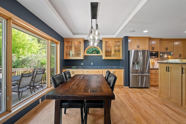 9610 28th Ave N, Plymouth, MN 55441 - dining area with recessed lighting, light wood-type flooring, and a tray ceiling