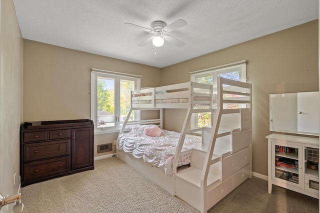 9610 28th Ave N, Plymouth, MN 55441 - bedroom with carpet, a textured ceiling, and ceiling fan