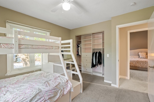 9610 28th Ave N, Plymouth, MN 55441 - bedroom with a closet, carpet floors, and ceiling fan