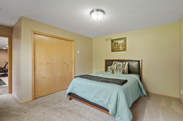 9610 28th Ave N, Plymouth, MN 55441 - carpeted bedroom with a closet and baseboards