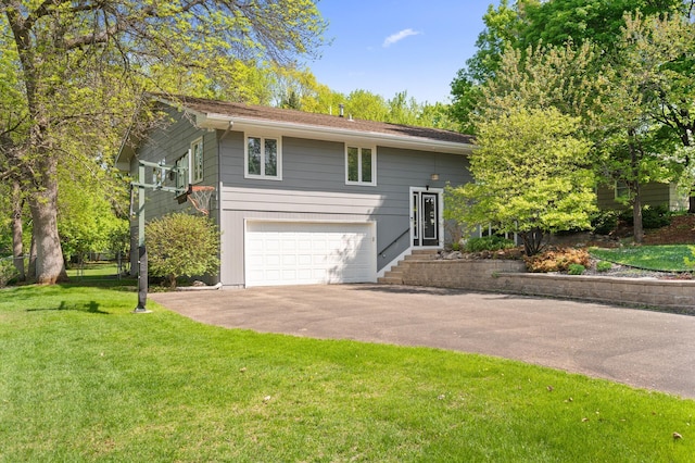 9610 28th Ave N, Plymouth, MN 55441 - view of side of property with asphalt driveway, an attached garage, and a yard