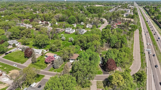 9610 28th Ave N, Plymouth, MN 55441 - aerial perspective of suburban area with a major roadway