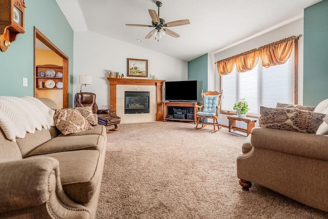 2711 Cedar Ave, Holmen, WI 54636 - living room featuring carpet, lofted ceiling, ceiling fan, and a tile fireplace