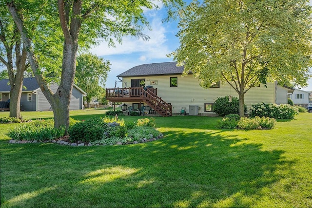 2711 Cedar Ave, Holmen, WI 54636 - rear view of property featuring stairway, a wooden deck, and a yard