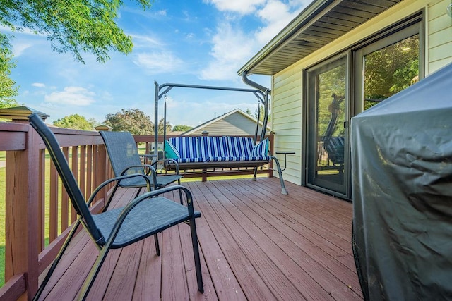 2711 Cedar Ave, Holmen, WI 54636 - wooden terrace with a grill