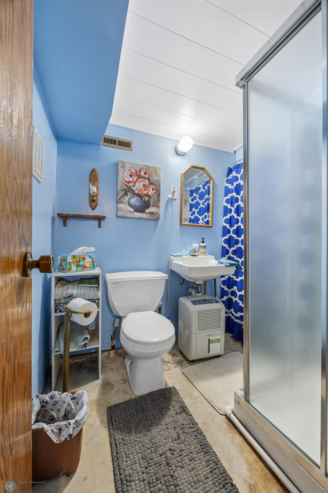 426 3rd Ave E, West Fargo, ND 58078 - full bath with a stall shower and unfinished concrete floors