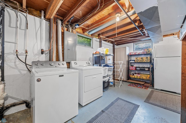 426 3rd Ave E, West Fargo, ND 58078 - laundry area featuring electric panel and separate washer and dryer