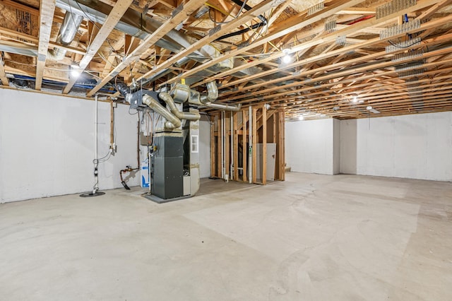 1661 Bush Ave, Saint Paul, MN 55106 - unfinished basement featuring heating unit