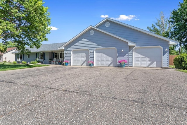 905 Sellards Dr, Dassel, MN 55325 - view of front of property featuring an attached garage and driveway