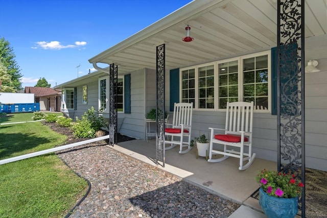 905 Sellards Dr, Dassel, MN 55325 - covered porch with a yard