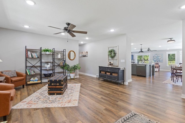 905 Sellards Dr, Dassel, MN 55325 - living room featuring ceiling fan, wood finished floors, and recessed lighting