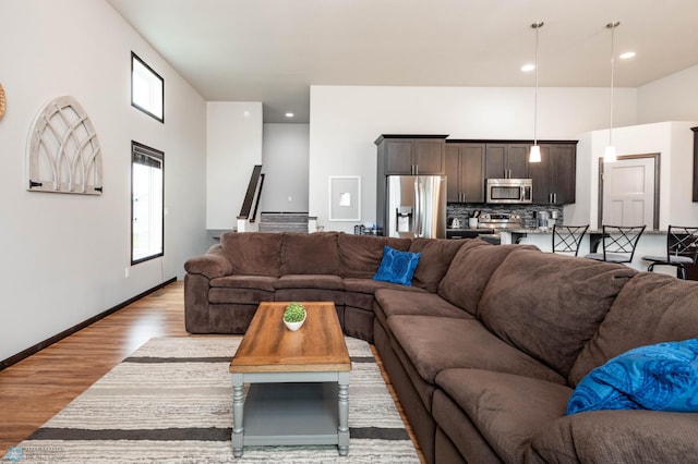 3137 6th St E, West Fargo, ND 58078 - living room with light wood-style flooring and baseboards