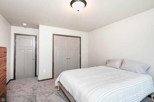 3137 6th St E, West Fargo, ND 58078 - carpeted bedroom featuring a closet and baseboards