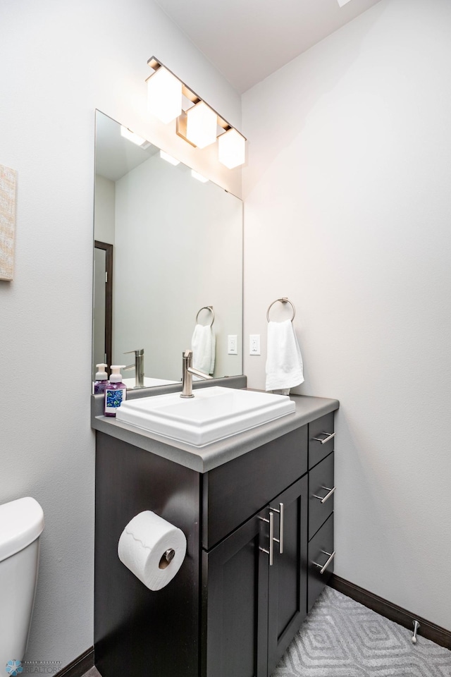 3137 6th St E, West Fargo, ND 58078 - bathroom featuring toilet and vanity
