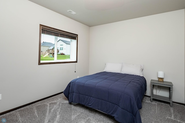 3137 6th St E, West Fargo, ND 58078 - bedroom featuring carpet and baseboards