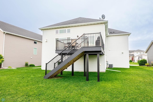 3137 6th St E, West Fargo, ND 58078 - rear view of house with stairway, a yard, and a deck
