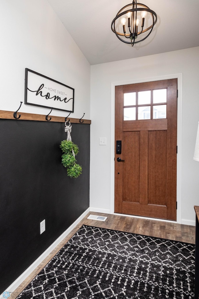 8827 Northern Lights Ave, Horace, ND 58047 - foyer with a chandelier and wood finished floors