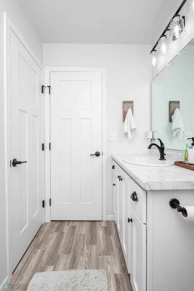 8827 Northern Lights Ave, Horace, ND 58047 - bathroom featuring vanity and wood finished floors