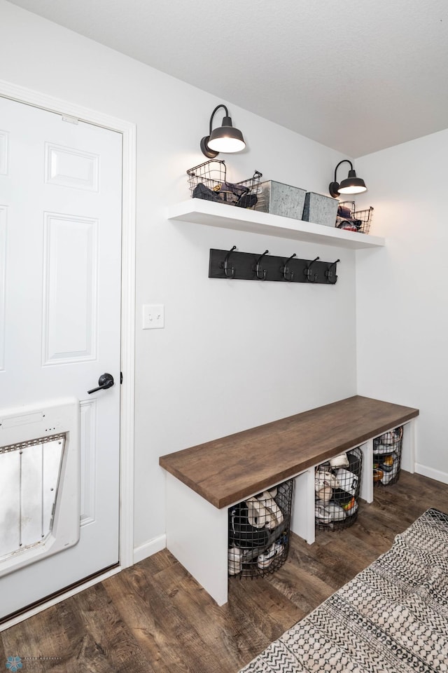 8827 Northern Lights Ave, Horace, ND 58047 - mudroom with dark wood-style flooring and baseboards