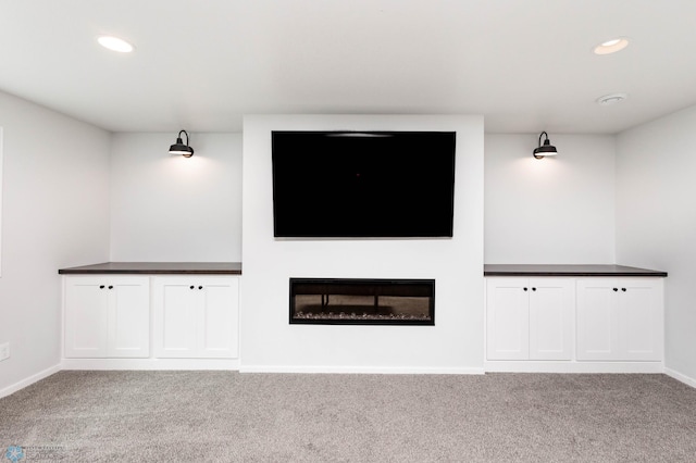 8827 Northern Lights Ave, Horace, ND 58047 - home theater featuring carpet, recessed lighting, and a fireplace