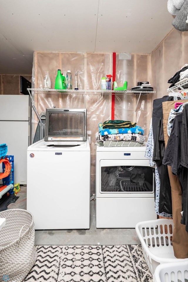 8827 Northern Lights Ave, Horace, ND 58047 - laundry area featuring washing machine and clothes dryer