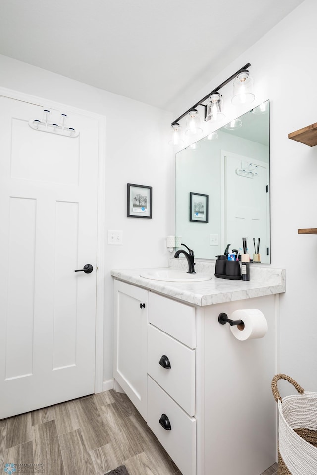 8827 Northern Lights Ave, Horace, ND 58047 - bathroom with vanity and wood finished floors
