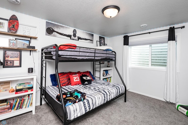 8827 Northern Lights Ave, Horace, ND 58047 - carpeted bedroom featuring a textured ceiling and baseboards