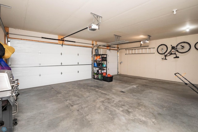 8827 Northern Lights Ave, Horace, ND 58047 - garage featuring a garage door opener
