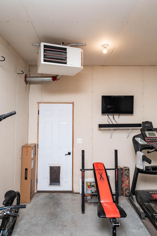 8827 Northern Lights Ave, Horace, ND 58047 - garage featuring a heating unit
