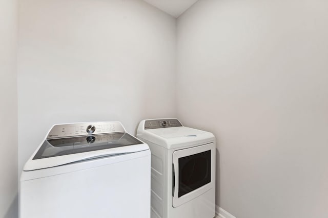 7419 E Ramsey Pkwy NW, Ramsey, MN 55303 - washroom featuring washer and clothes dryer