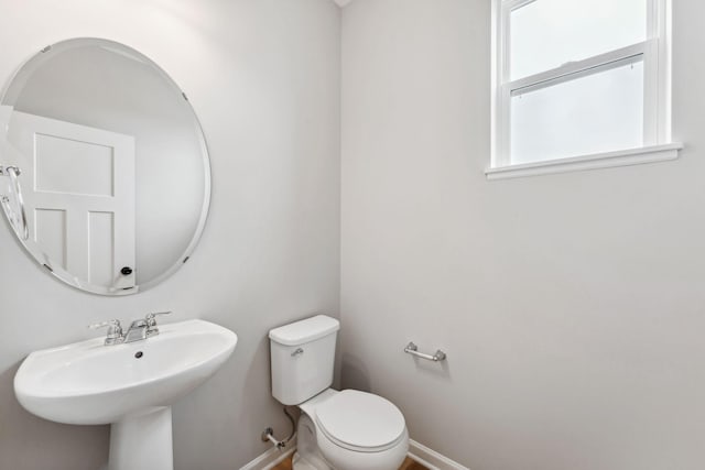 7419 E Ramsey Pkwy NW, Ramsey, MN 55303 - bathroom featuring a sink and toilet