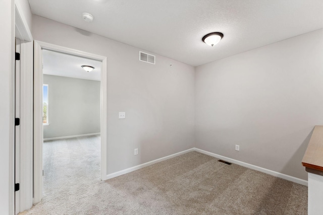 7419 E Ramsey Pkwy NW, Ramsey, MN 55303 - spare room with carpet flooring and a smoke detector