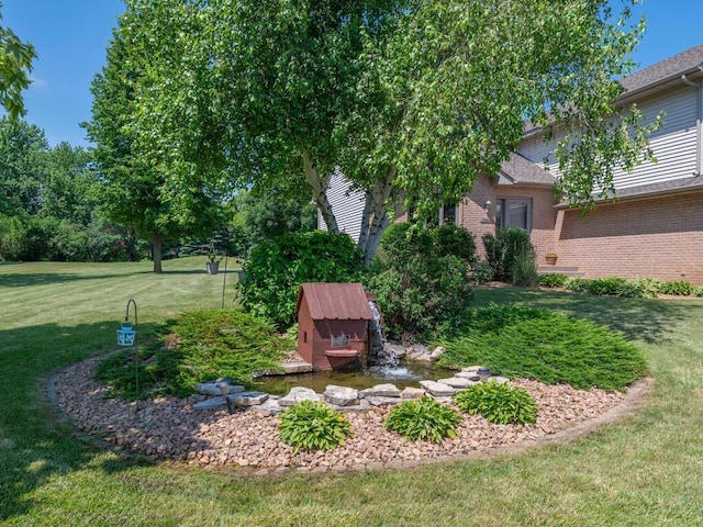 13680 57th St NE, Saint Michael, MN 55376 - view of green lawn with a shed