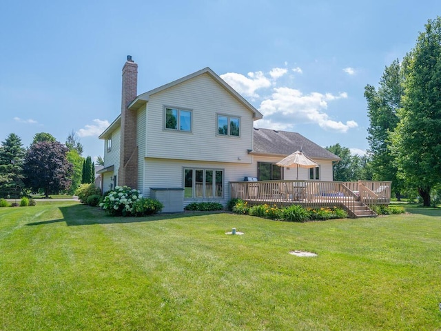 13680 57th St NE, Saint Michael, MN 55376 - rear view of house featuring a chimney, a lawn, and a deck
