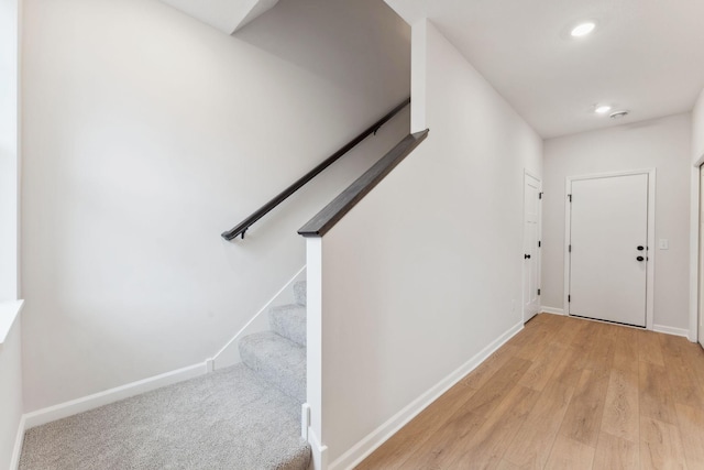 7415 E Ramsey Pkwy NW, Ramsey, MN 55303 - stairway featuring wood finished floors and recessed lighting