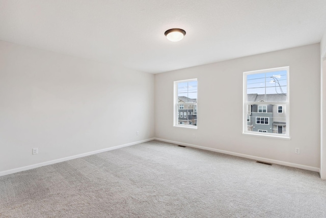 7415 E Ramsey Pkwy NW, Ramsey, MN 55303 - carpeted spare room with baseboards