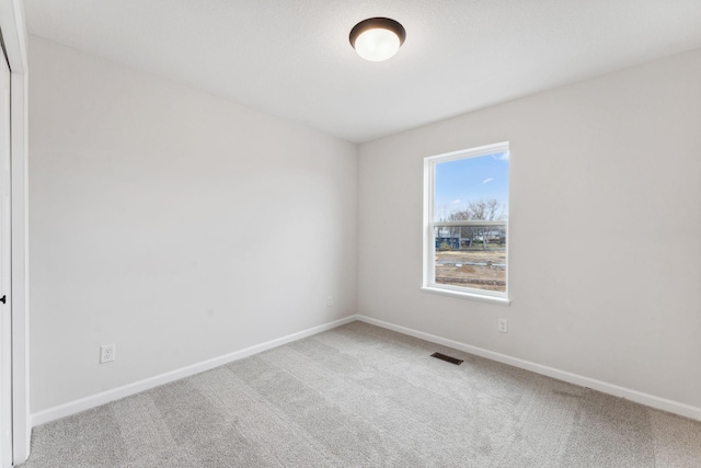 7415 E Ramsey Pkwy NW, Ramsey, MN 55303 - carpeted empty room featuring baseboards