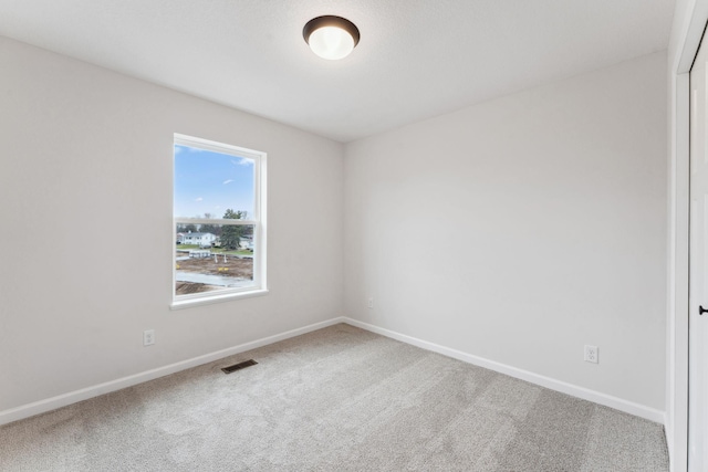 7415 E Ramsey Pkwy NW, Ramsey, MN 55303 - carpeted spare room with baseboards