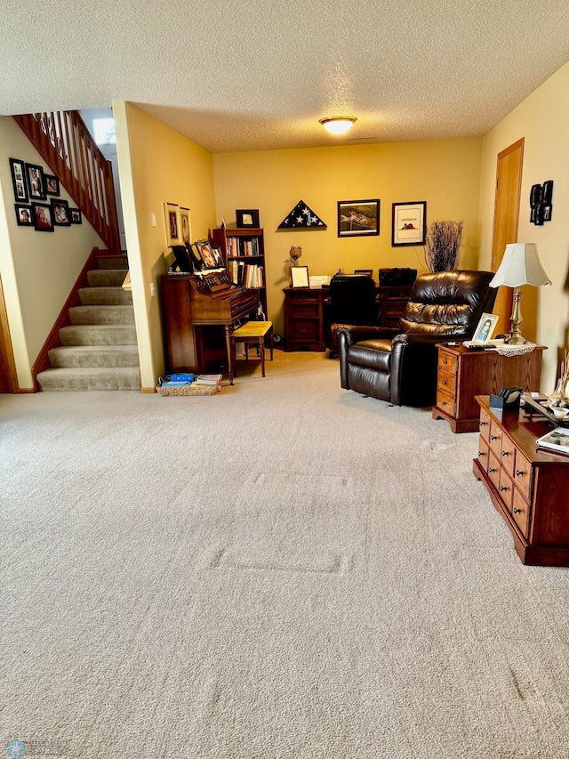 1815 49th St S, Fargo, ND 58103 - living area featuring carpet floors, a textured ceiling, and stairs
