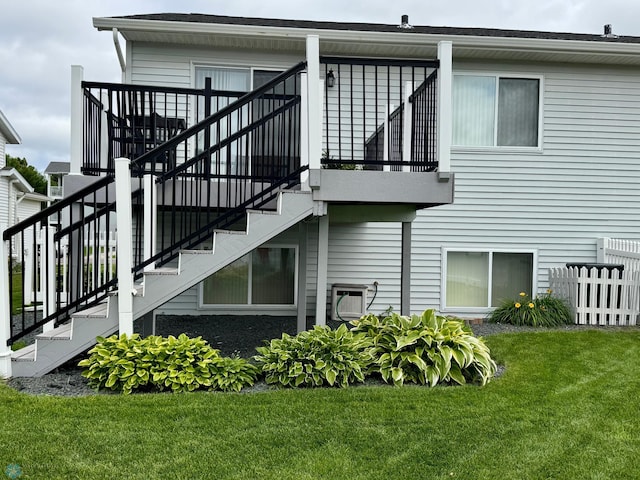 1815 49th St S, Fargo, ND 58103 - view of property exterior featuring stairway and a lawn