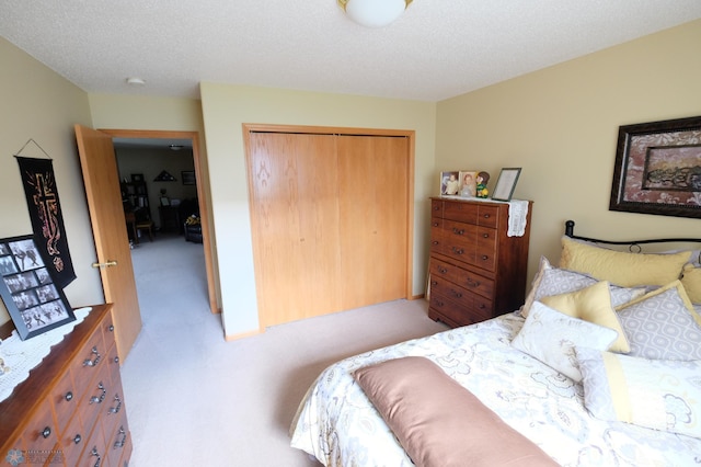 1815 49th St S, Fargo, ND 58103 - carpeted bedroom featuring a closet and a textured ceiling