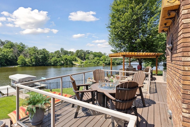 708 Riverside Dr N, North Hudson, WI 54016 - wooden deck featuring a water view