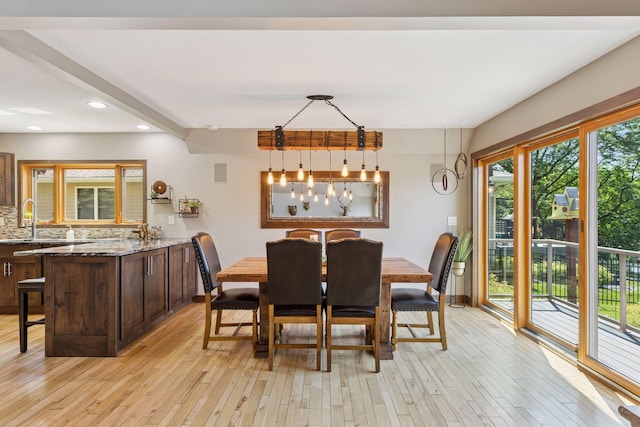 708 Riverside Dr N, North Hudson, WI 54016 - dining area with light wood-style flooring and recessed lighting