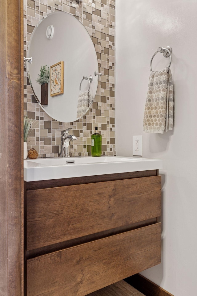 708 Riverside Dr N, North Hudson, WI 54016 - bathroom with vanity and decorative backsplash